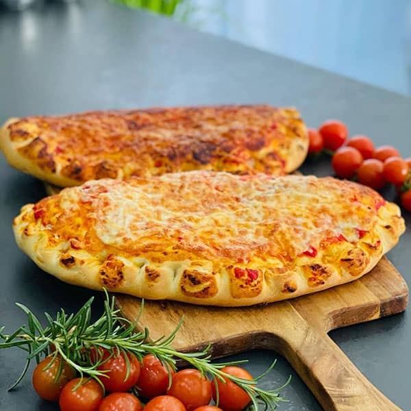 طرز تهیه پیتزا کالزونه طرز تهیه کالزونه مارپیچی طرز تهیه کالزونه مرغ پیتزا کالزونه چیست خمیر کالزونه